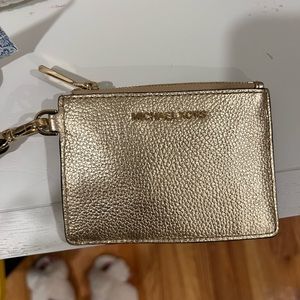 Michael kors gold wallet keychain.